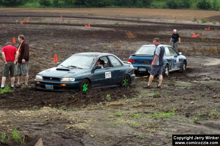 Martin Asao's MA Subaru Impreza gets a tug from Brian Chabot's MA Subaru Impreza