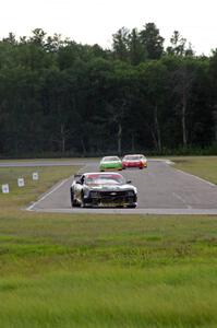 Bob Stretch's Chevy Camaro, Bill Prietzel's Chevy Monte Carlo, Ricky Sanders' Chevy Monte Carlo and Tim Gray's Porsche GT3 Cup