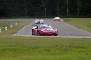 Amy Ruman's Chevy Corvette, Cliff Ebben's Ford Mustang and Simon Gregg's Chevy Corvette