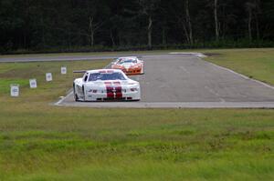 Cliff Ebben's Ford Mustang and Simon Gregg's Chevy Corvette