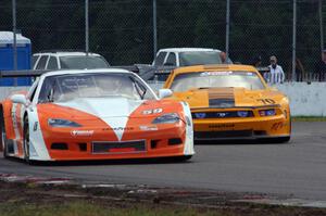 Simon Gregg's Chevy Corvette and David Jans' Ford Mustang