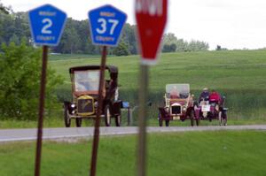 Alan Page's 1906 Buick, Ricki Bajari's 1910 Maxwell and Carlton Pate's 1903 Ford