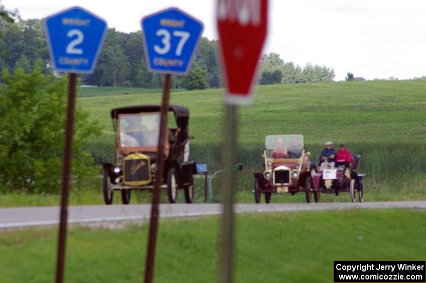 Alan Page's 1906 Buick, Ricki Bajari's 1910 Maxwell and Carlton Pate's 1903 Ford