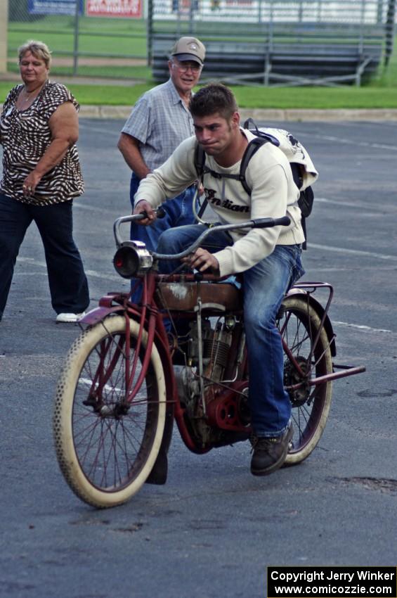 Ron Gardas, Jr. starts his 1912 Indian motorcycle