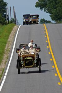 Chris Figge's 1906 Buick, Gregg Lange's 1904 Autocar, Conrad Fletcher's 1907 Stevens Duryea and Art Mehr's 1911 Maxwell