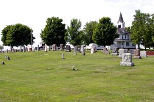 A graveyard and church 15 miles west of Buffalo on Co. Rd. 35