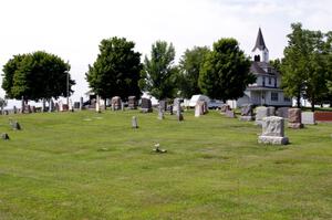 A graveyard and church 15 miles west of Buffalo on Co. Rd. 35