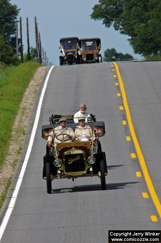 Chris Figge's 1906 Buick, Gregg Lange's 1904 Autocar, Conrad Fletcher's 1907 Stevens Duryea and Art Mehr's 1911 Maxwell