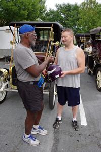 Alan Page signs an autograph for a fan