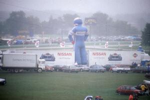 Giant inflatable Nissan driver in the fog