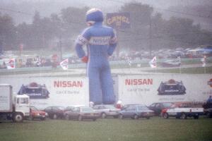 Giant inflatable Nissan driver in the fog