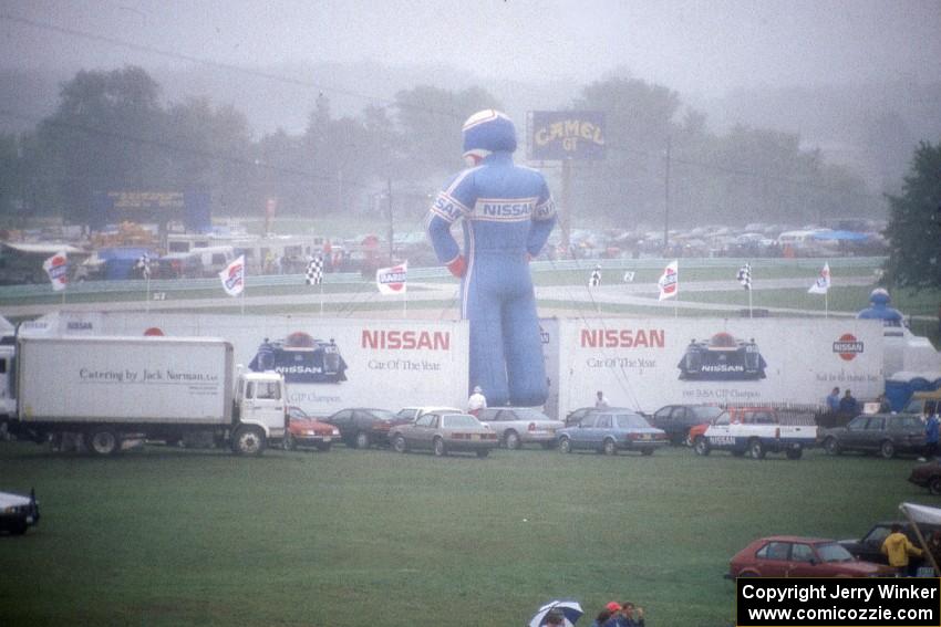 Giant inflatable Nissan driver in the fog