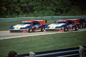 Steve Millen's Nissan 300ZX (GTS) and Jeremy Dale's Nissan 300ZX (GTS) nips Darin Brassfield's Olds Cutlass (GTS) into turn one