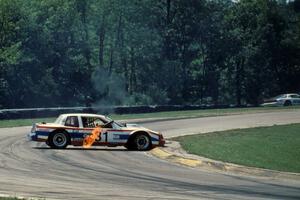 Bill Fuller's Buick Somerset (GTO) spins at turn one and the engine won't refire