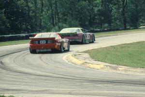Bruce Nesbitt's Chevy Camaro (GTO) ahead of Kendall Cranston's	Chevy Camaro (GTO)