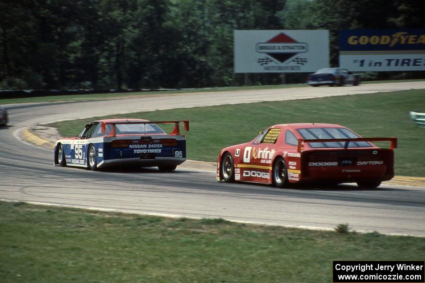 Bob Leitzinger's Nissan 240SX (GTU) leads John Fergus' Dodge Daytona (GTU)