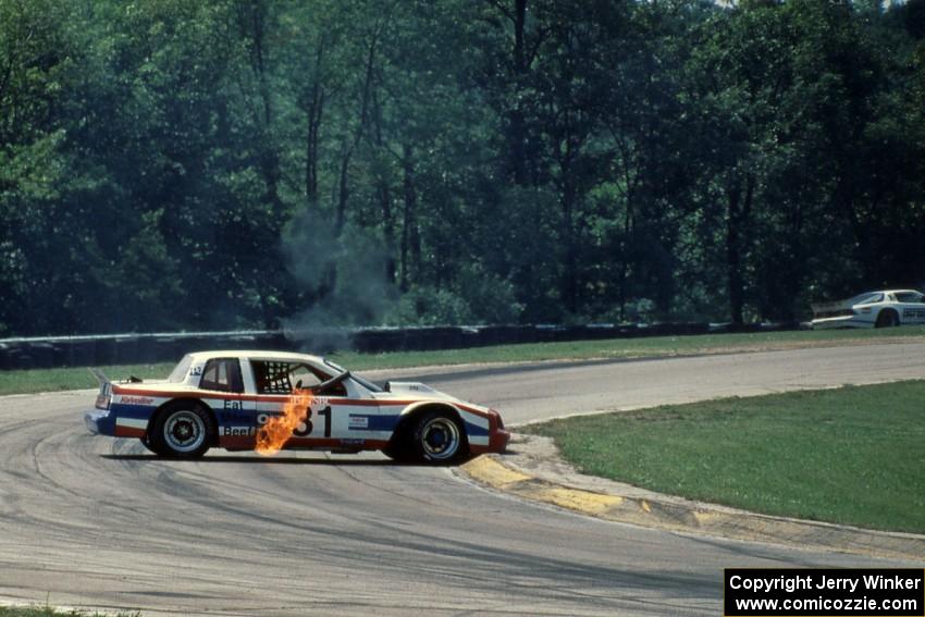 Bill Fuller's Buick Somerset (GTO) spins at turn one and the engine won't refire