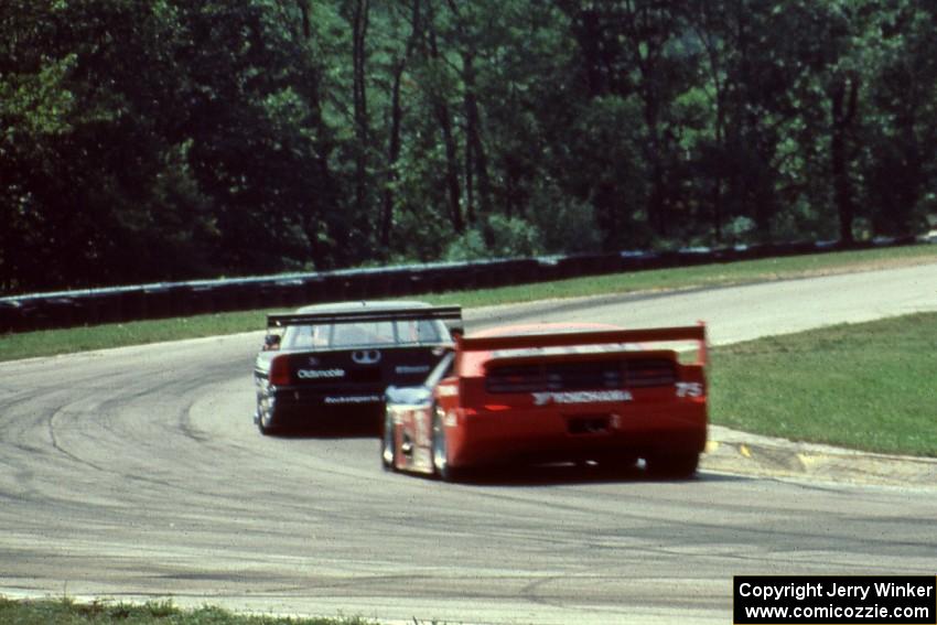 Paul Gentilozzi's Olds Cutlass (GTS) leads Steve Millen's Nissan 300ZX (GTS)