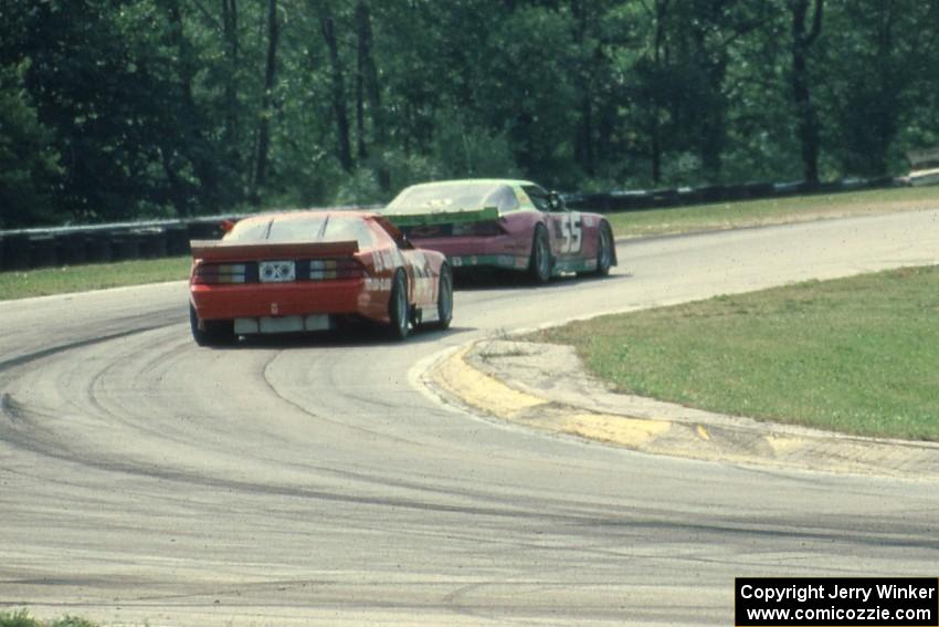 Bruce Nesbitt's Chevy Camaro (GTO) ahead of Kendall Cranston's	Chevy Camaro (GTO)