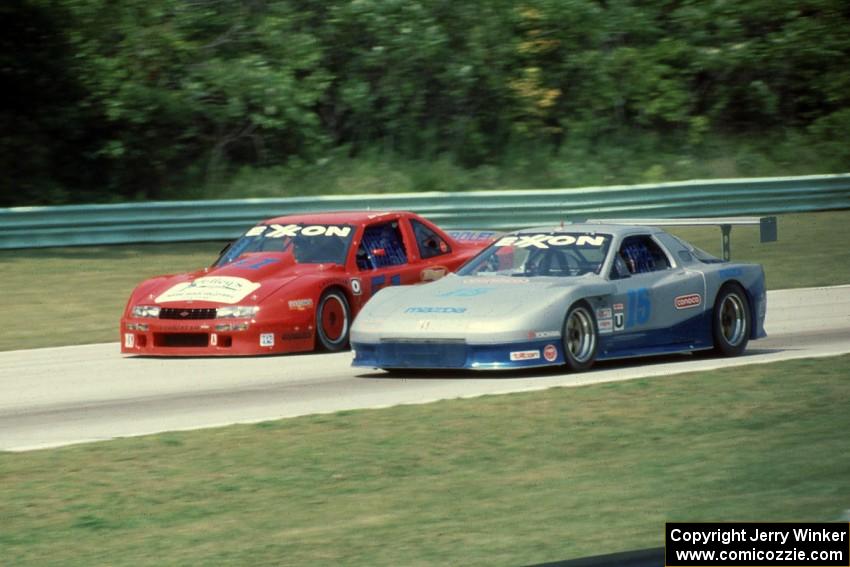 Jim Trotnow's Chevy Beretta (GTO) goes to the inside of Eduardo Pellerano's Mazda RX-7 (GTU)