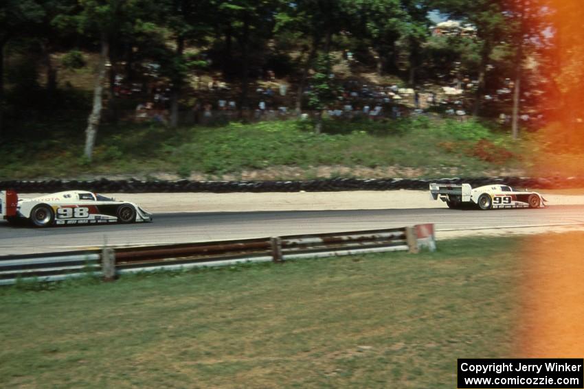 The Eagle Mk. III/Toyotas of P.J. Jones and Juan-Manuel Fangio II exit Canada Corner