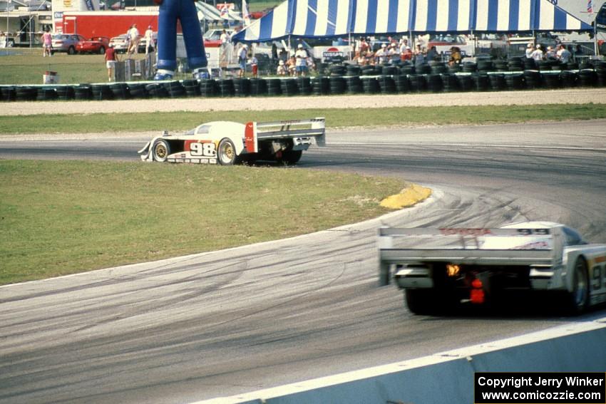 The Eagle Mk. III/Toyotas of P.J. Jones and Juan-Manuel Fangio II through corner 5