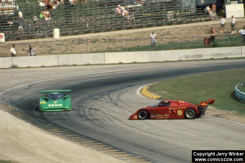 John Grooms / Frank Jellinek Kudzu DG-1/Mazda  (Lights) passes the sideways Tom Hessert / Bob Schader Spice SE87L/Buick (Lights)