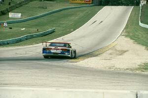 Butch Leitzinger's Nissan 240SX (GTU) comes out of corner 5