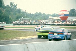 Sports class battle in turn 5 on lap one