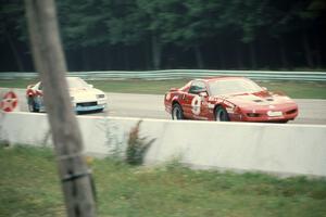 Mike Gagliardo / Doug Goad Pontiac Firebird leads George Robinson / Joe Varde Chevy Camaro