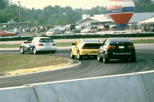 Scott Kronn / Bob Roth Honda Civic Si, Todd Freeman / Jon Klapperick Honda CRX Si and Mark Behm / Phil Pate VW Corrado