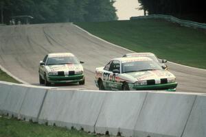 Paul Hacker / Karl Hacker and Chuck Hemmingson / Buddy Norton Olds Achieva SCXs with one of the Dodge Stealths splitting them