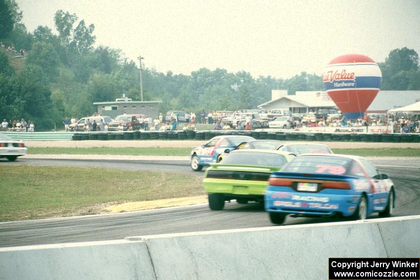 Sports class battle in turn 5 on lap one