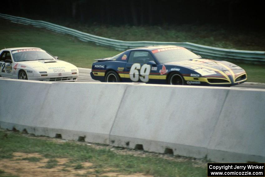 Larry Rehagen / Larry Schumacher Pontiac Firebird and Bruce Myers / Hugh Johnson Mazda RX-7 Turbo