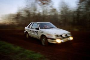 Henry Krolikowski / Cindy Krolikowski Dodge Shadow at speed on the practice stage.