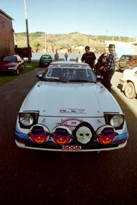 Mike Hurst / Rob Bohn Mazda RX-7 at parc expose outside Dee Stadium.