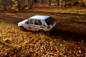 Wayne Prochaska / Annette Prochaska VW Golf kicks up leaves near the flying finish of SS1, Beacon Hill.