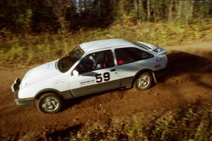 Colin McCleery / Tom Beltman Merkur XR4Ti comes accross the flying finish at the end of SS1, Beacon Hill.