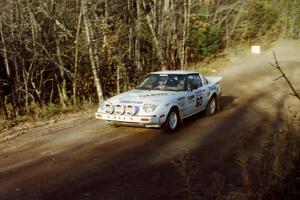 Ted Grzelak / Chris Plante Mazda RX-7 comes accross the flying finish at the end of SS1, Beacon Hill.