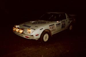 Ted Grzelak / Chris Plante Mazda RX-7 at a 90-left on SS3, Far Point I.