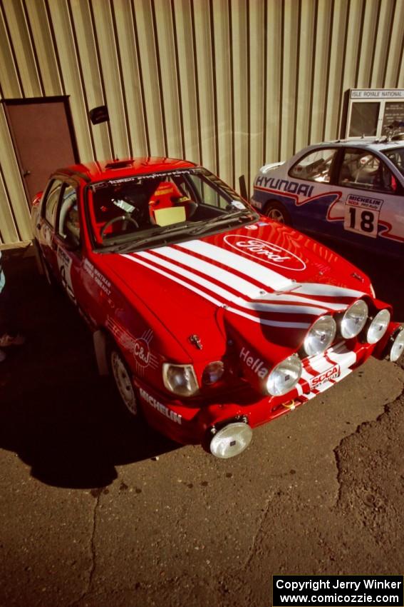 Mike Whitman / Paula Gibeault Ford Sierra Cosworth at parc expose outside Dee Stadium.