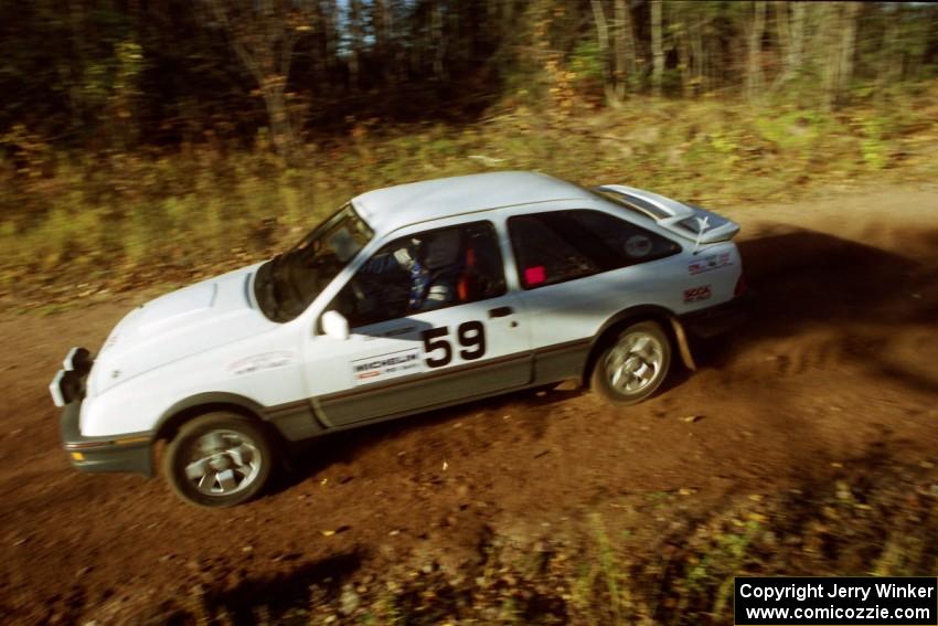 Colin McCleery / Tom Beltman Merkur XR4Ti comes accross the flying finish at the end of SS1, Beacon Hill.