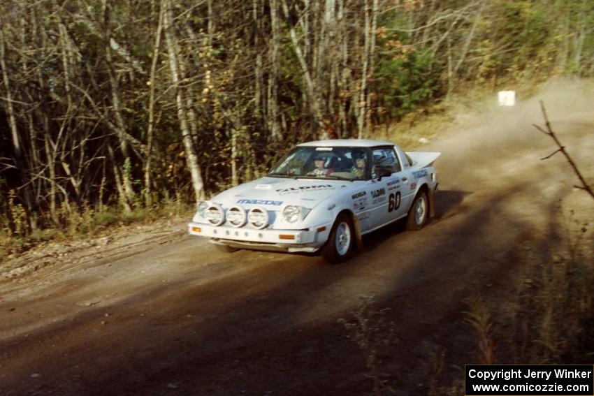 Ted Grzelak / Chris Plante Mazda RX-7 comes accross the flying finish at the end of SS1, Beacon Hill.