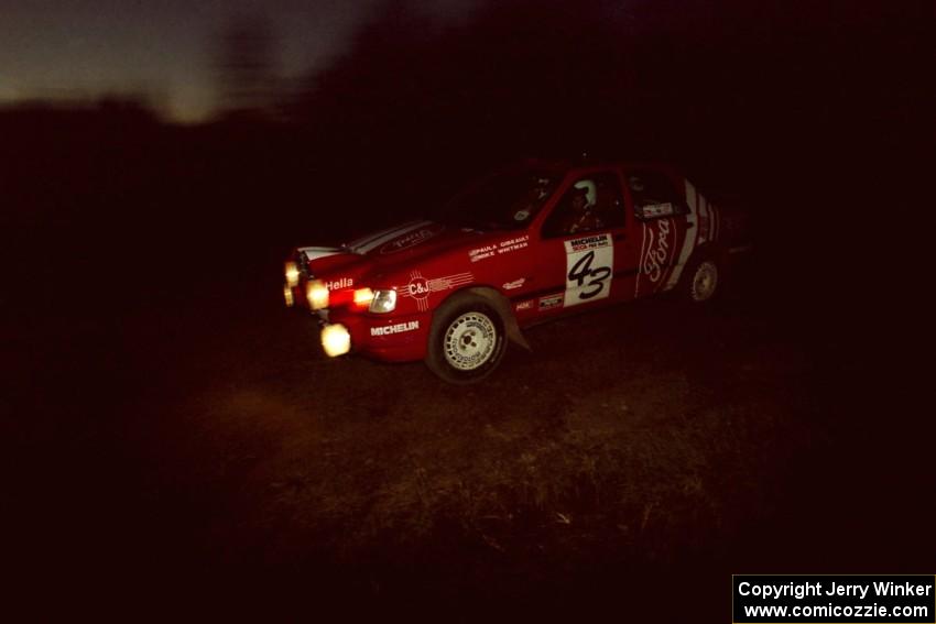 Mike Whitman / Paula Gibeault Ford Sierra Cosworth at a 90-left on SS3, Far Point I.