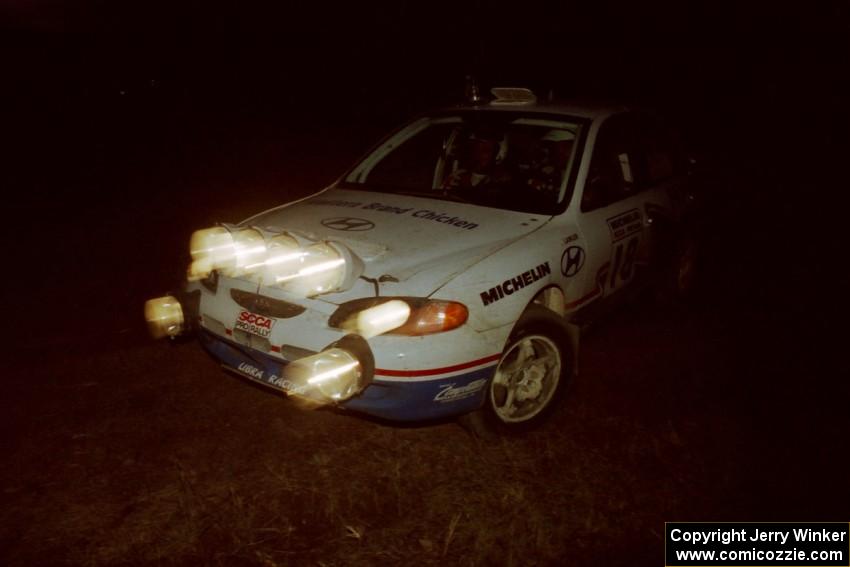 Noel Lawler / Charles Bradley Hyundai Elantra at a 90-left on SS3, Far Point I.