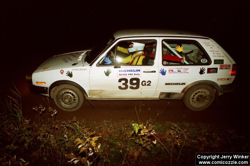 Wayne Prochaska / Annette Prochaska VW Golf at speed on SS8, Bob Lake II.