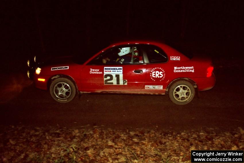 Trevor Donison / John Allen Plymouth Neon comes into the flying finish of SS10, Fuller Lake.