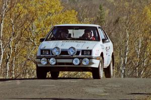 Henry Krolikowski / Cindy Krolikowski Dodge Shadow at speed on SS13, Brockway I.