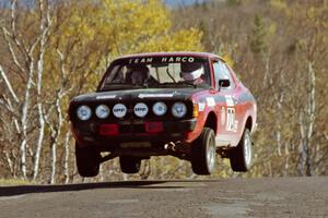 Scott Harvey, Jr. / David Watts Dodge Colt catches nice air at the final yump on SS13, Brockway I.