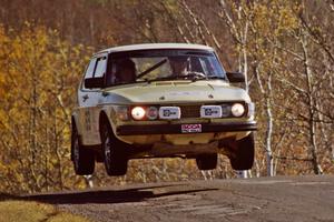 Tim Winker / Paul Moormann SAAB 99 catches air on SS13, Brockway I.